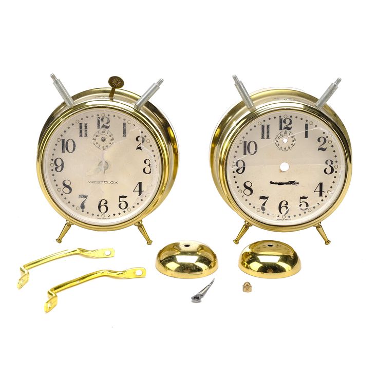 Lot 903 HOOK (1991) Two GoldColor Broken Alarm Clocks