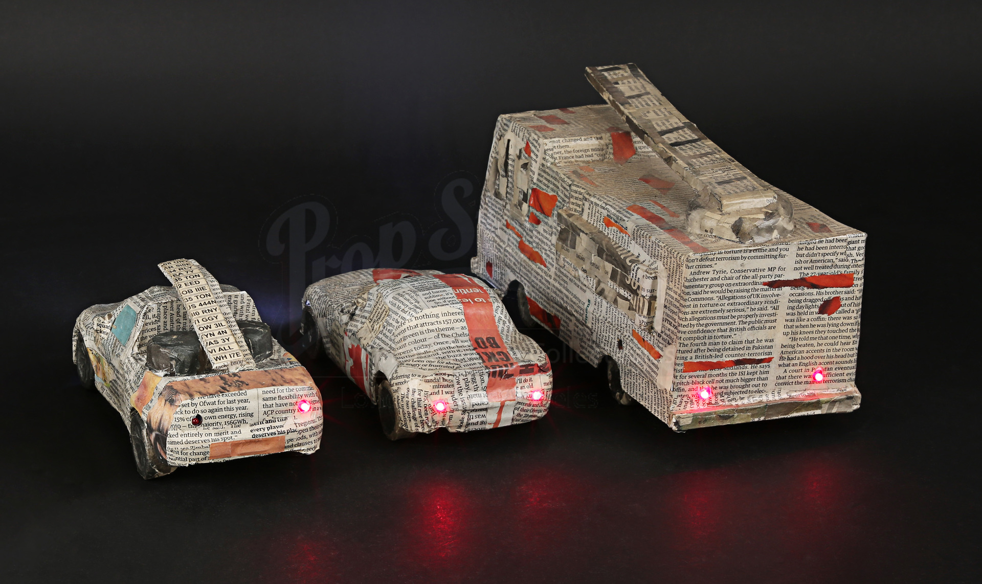 Light-Up Paper Mache Cars | Prop Store - Ultimate Movie Collectables