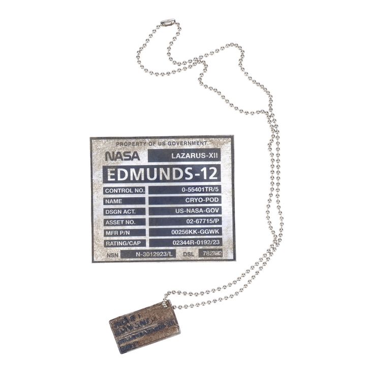 Lot 155 INTERSTELLAR (2014) Dr. Wolf Edmunds' Grave Plaque and Dog Tag